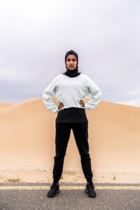 Beautiful arab sportive woman wearing hijab training outdoors
